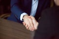 Close up of male partners handshaking after successful meeting Royalty Free Stock Photo