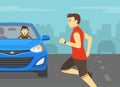 Close-up of a male pedestrian running in front of the vehicle to cross the road. Car is about to hit the man on road. Royalty Free Stock Photo