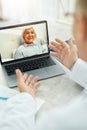 Cheerful old woman having online consultation with doctor Royalty Free Stock Photo