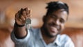 Close up of male renter show house keys Royalty Free Stock Photo