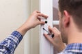 Repairman Fixing Window With Screwdriver Royalty Free Stock Photo