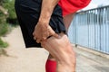 Runner Holding His Injured Leg Royalty Free Stock Photo