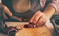 Man cutting red onion Royalty Free Stock Photo