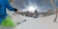 CLOSE UP: Male skier shreds fresh powder during a tree skiing trip in Park City.