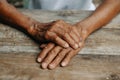 Male wrinkled hands, old man is wearing Royalty Free Stock Photo