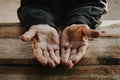 Close up of male wrinkled hands, old man is wearing on the wood. vintage tone