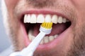 Close-up Of A Man Brushing Teeth Royalty Free Stock Photo