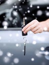 Close up of man with car key outdoors Royalty Free Stock Photo