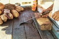 Close up of man cutting a coconut with a big Indian knife. Sale of coconuts. Indian street market,coconut cutting weapon,weapon of