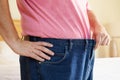 Close Up Of Man On Diet Losing Weight From Waist Royalty Free Stock Photo