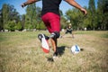 Close-up of man with disability playing football with son Royalty Free Stock Photo