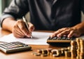 Close up man doing finance at home office, using calculator to calculate expenses on notebook, AI Generated