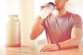 Close up of man drinking protein shake Royalty Free Stock Photo