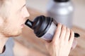 Close up of man drinking protein shake Royalty Free Stock Photo