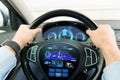 Close up of man driving car with gps navigator Royalty Free Stock Photo