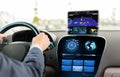 Close up of man driving car with navigation system Royalty Free Stock Photo