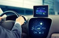 Close up of man driving car with navigation system Royalty Free Stock Photo