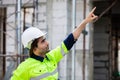 Close up man engineer builder house construction. male architect standing at home construction. foreman in workplace
