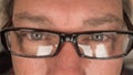 Close up of a man eyes wearing glasses Royalty Free Stock Photo