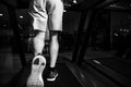 Close-Up Man Feet On Treadmill Royalty Free Stock Photo