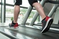 Close-Up Man Feet On Treadmill Royalty Free Stock Photo