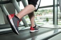 Close-Up Man Feet On Treadmill Royalty Free Stock Photo