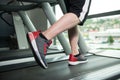 Close-Up Man Feet On Treadmill Royalty Free Stock Photo