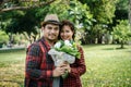 Close-up of a man giving happy woman flowers.A picture of a romantic couple Royalty Free Stock Photo