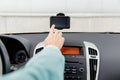 Close up of man with gps navigator driving car Royalty Free Stock Photo