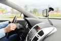 Close up of man with gps navigator driving car Royalty Free Stock Photo