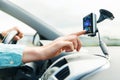 Close up of man with gps navigator driving car Royalty Free Stock Photo