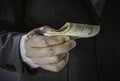 man hand with Euro money for Venality, bribe, corruption concept as Hand giving money Royalty Free Stock Photo