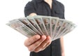 Close up of a man hand offering money banknotes