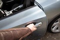 Close up of a man hand opening car door Royalty Free Stock Photo