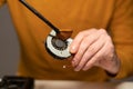 Close up of man hands cleaning the cooler system of laptop with little brush during maintenance. Repair of electronic Royalty Free Stock Photo