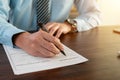 Close up man hands is filling out a job application form. Unemployed concept Royalty Free Stock Photo