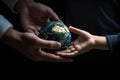 Close up of man hands giving planet earth to a child over defocused green background. Generative AI Royalty Free Stock Photo