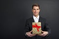 Close up of man hands holding gift box Royalty Free Stock Photo
