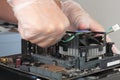 Close up of man hands installing CPU cooler fan on new, modern Royalty Free Stock Photo