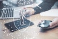 Close up of man hands using laptop, tablet and smartphone at desktop with abstract padlock shield inside polygonal sphere on Royalty Free Stock Photo