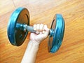 Close up of man holding barbell in gym Royalty Free Stock Photo