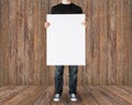 Close up of man holding big blank white board Royalty Free Stock Photo