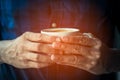 Close up of Man holding cup of coffee in his hands Royalty Free Stock Photo