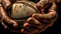 a close-up of a man holding a football Royalty Free Stock Photo