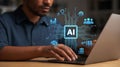 Artificial intelligence concept man using laptop with glowing AI circuitry and data analytics icons for innovative technologies Royalty Free Stock Photo