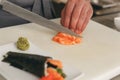 Close up of man japanese restaurant chef cooking sushi in the kitchen Royalty Free Stock Photo