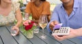 Close Up Of Man Making Contactless Payment At Outdoor Bar Or Restaurant Using Credit Or Debit Card Royalty Free Stock Photo