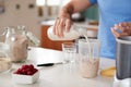 Close Up Of Man Making Protein Shake After Exercise At Home Royalty Free Stock Photo