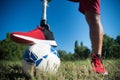 Close-up of man with mechanical leg playing football