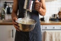 Close-up of a man mixing flour in a bowl at home Royalty Free Stock Photo